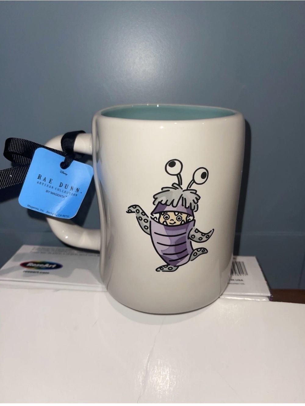 Rae Dunn Cream Mug with Purple Monster and Light Blue Interior